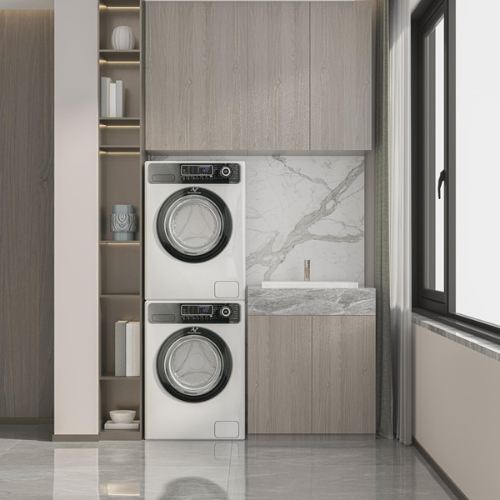 Renovated laundry with stacked washer and dryer, timber cabinetry and a marble splashback