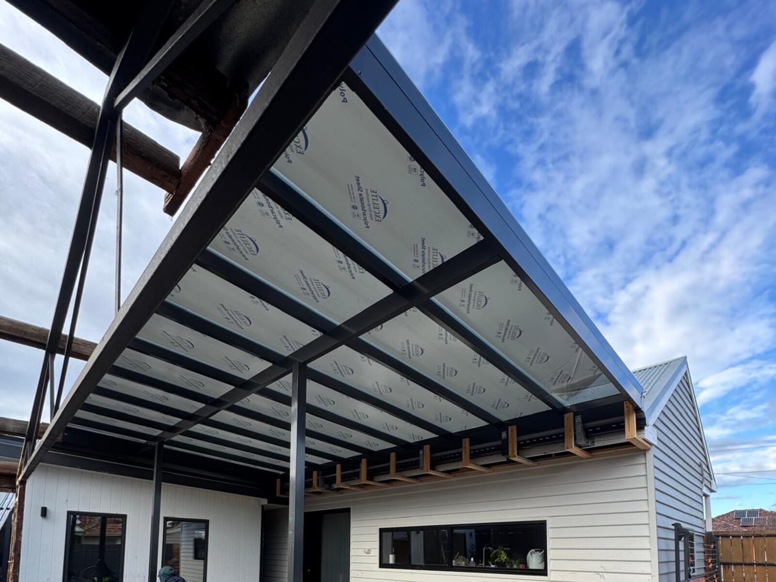 Alfresco roof and weatherboard cladding complete