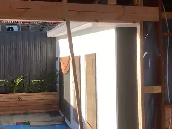 Load-bearing wall removed and new opening framed