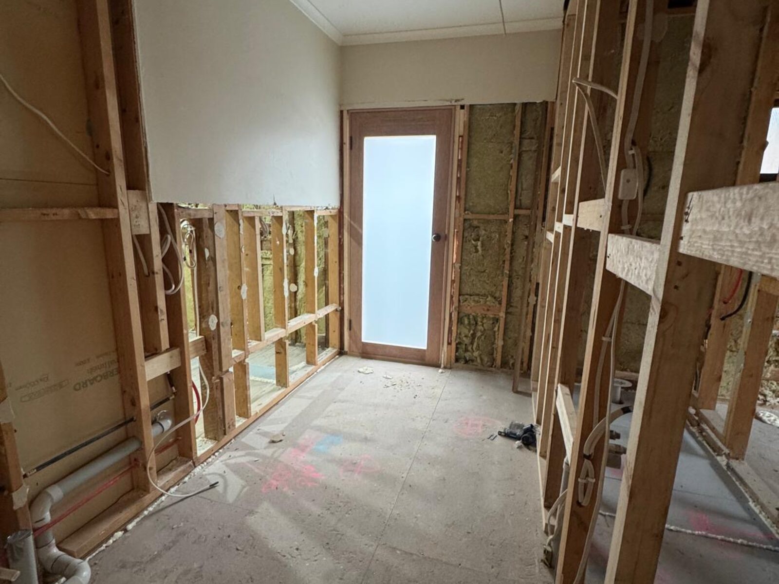 Full strip-out and re-framing of hallway