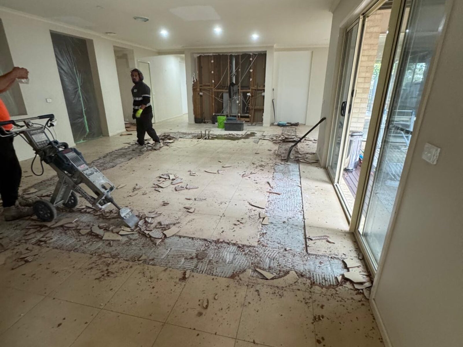 Tile removal for open-plan living conversion